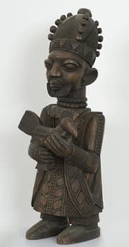 Yoruba Priest With Cockerel by Lamidi Fakeye